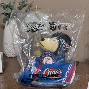 New Raising Canes 2026 Limited Edition Plush Dog & USA Bobsled Skeleton SEALED